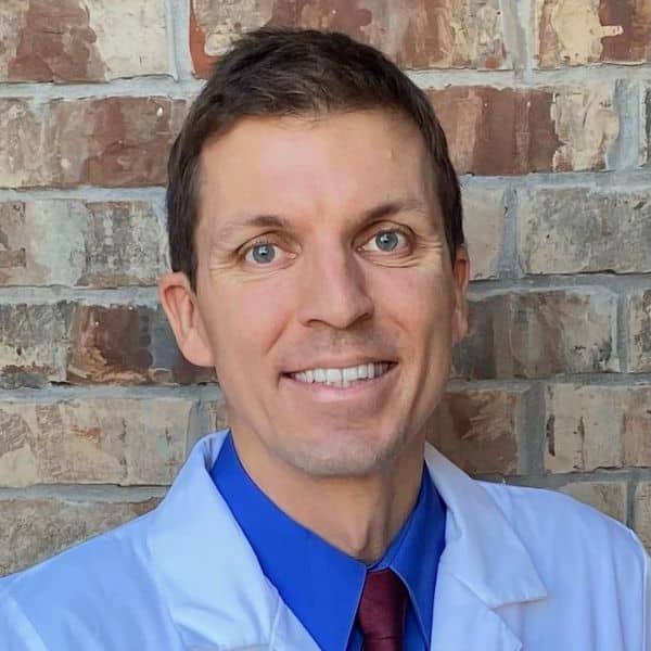 closed up portrait of Dr. James Garrett working at Spearmint Dental & Orthodontics, in Princeton and Wichita Falls, TX